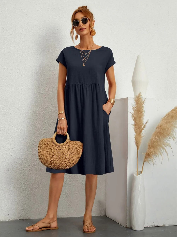 Delina – Midi-Kleid mit Silhouette im Sonnenuntergang
