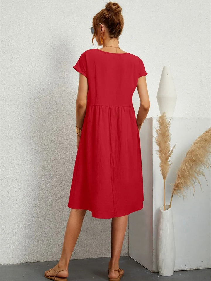 Delina – Midi-Kleid mit Silhouette im Sonnenuntergang