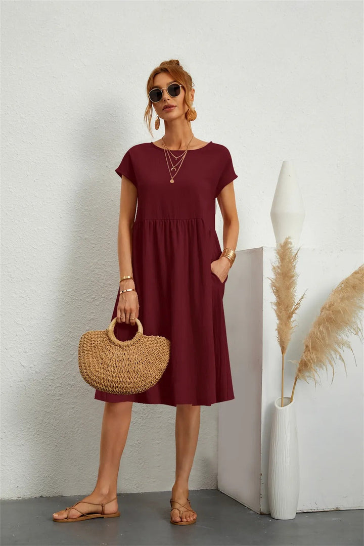 Delina – Midi-Kleid mit Silhouette im Sonnenuntergang